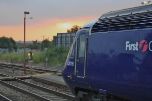 sun setting on the 18th June 2013 at Bristol Parkway behind 43176
